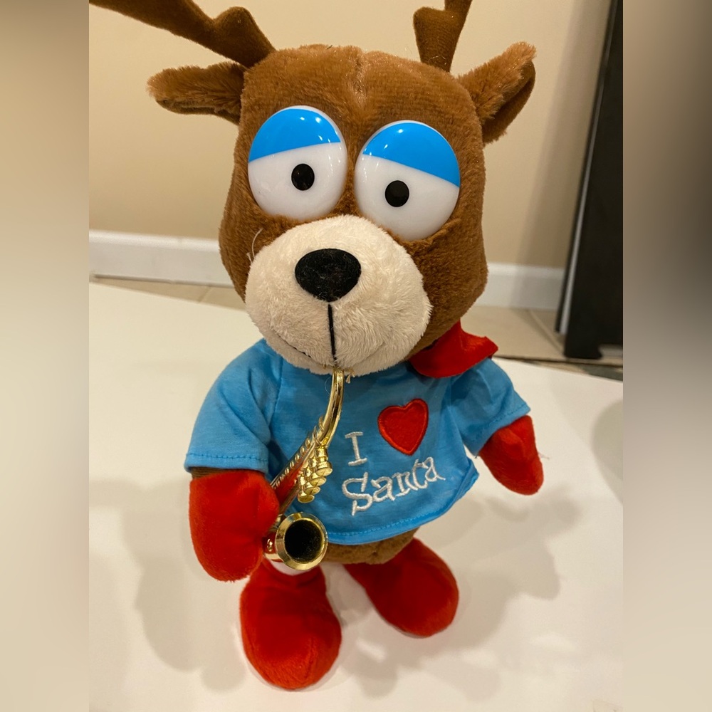 Bear reindeer Plush playing trumpet plays music and moves